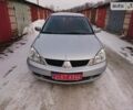 Сірий Міцубісі Lancer, об'ємом двигуна 1.6 л та пробігом 98 тис. км за 6999 $, фото 1 на Automoto.ua