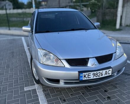 Серый Мицубиси Лансер, объемом двигателя 1.6 л и пробегом 236 тыс. км за 4444 $, фото 1 на Automoto.ua