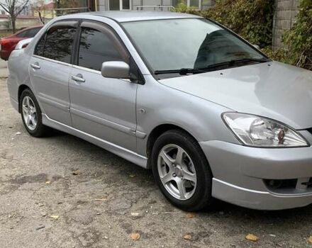 Сірий Міцубісі Lancer, об'ємом двигуна 1.6 л та пробігом 196 тис. км за 3800 $, фото 1 на Automoto.ua