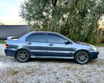 Сірий Міцубісі Lancer, об'ємом двигуна 1.6 л та пробігом 221 тис. км за 4500 $, фото 1 на Automoto.ua