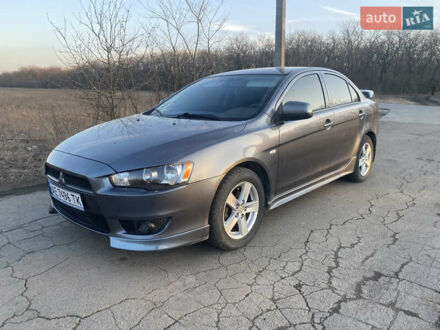 Міцубісі Lancer 2007 у Новомосковске на Automoto.ua Сірий Міцубісі Lancer, об'ємом двигуна 2 л та пробігом 205 тис. км за 7000 $, фото 1 на Automoto.ua