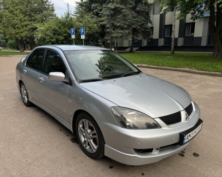 Сірий Міцубісі Lancer, об'ємом двигуна 2 л та пробігом 202 тис. км за 4800 $, фото 1 на Automoto.ua