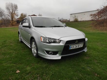 Сірий Міцубісі Lancer, об'ємом двигуна 2 л та пробігом 124 тис. км за 7499 $, фото 1 на Automoto.ua