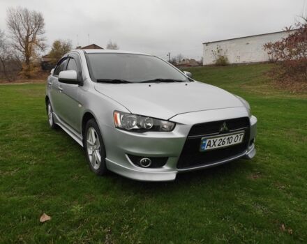 Серый Мицубиси Лансер, объемом двигателя 2 л и пробегом 124 тыс. км за 7499 $, фото 1 на Automoto.ua