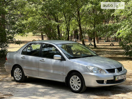 Сірий Міцубісі Lancer, об'ємом двигуна 1.6 л та пробігом 236 тис. км за 3999 $, фото 1 на Automoto.ua