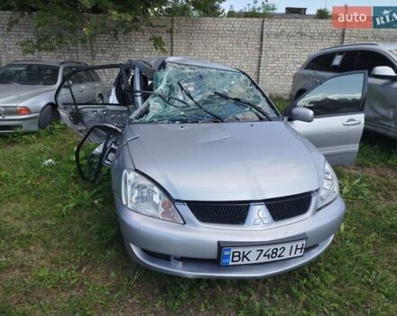 Серый Мицубиси Лансер, объемом двигателя 1.6 л и пробегом 270 тыс. км за 1100 $, фото 1 на Automoto.ua