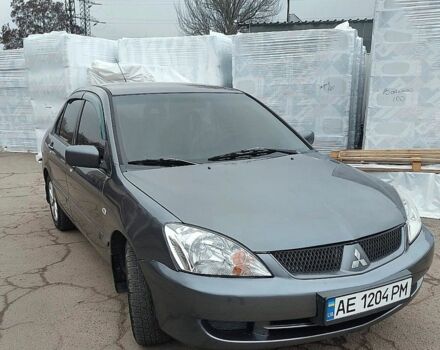 Сірий Міцубісі Lancer, об'ємом двигуна 1.6 л та пробігом 220 тис. км за 4200 $, фото 1 на Automoto.ua