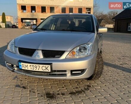 Сірий Міцубісі Lancer, об'ємом двигуна 1.6 л та пробігом 206 тис. км за 3499 $, фото 1 на Automoto.ua