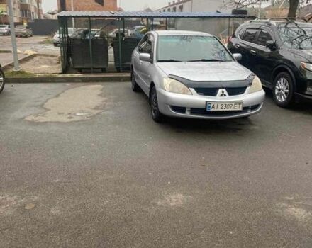 Сірий Міцубісі Lancer, об'ємом двигуна 1.6 л та пробігом 369 тис. км за 3200 $, фото 1 на Automoto.ua