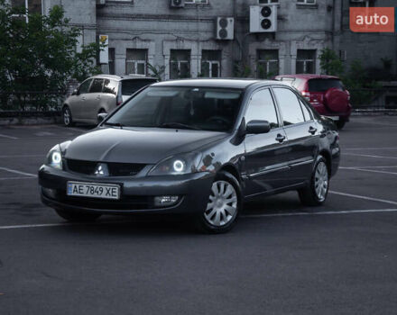 Сірий Міцубісі Lancer, об'ємом двигуна 1.58 л та пробігом 283 тис. км за 4600 $, фото 1 на Automoto.ua