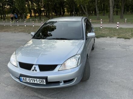 Сірий Міцубісі Lancer, об'ємом двигуна 1.6 л та пробігом 272 тис. км за 4800 $, фото 1 на Automoto.ua