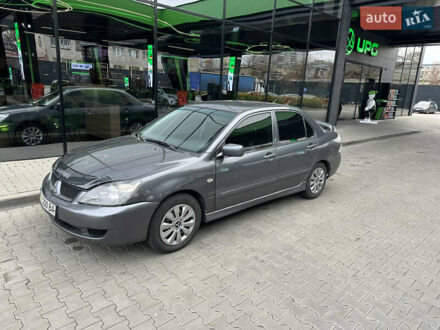 Сірий Міцубісі Lancer, об'ємом двигуна 1.6 л та пробігом 115 тис. км за 2800 $, фото 1 на Automoto.ua