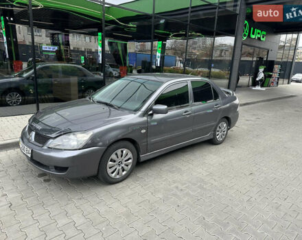 Сірий Міцубісі Lancer, об'ємом двигуна 1.6 л та пробігом 115 тис. км за 2800 $, фото 1 на Automoto.ua