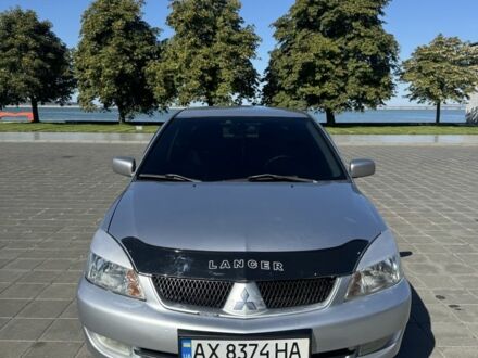 Мицубиси Лансер 2007 в Светловдске на Automoto.ua Серый Мицубиси Лансер, объемом двигателя 1.6 л и пробегом 265 тыс. км за 4100 $, фото 1 на Automoto.ua