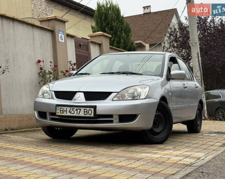 Сірий Міцубісі Lancer, об'ємом двигуна 1.6 л та пробігом 221 тис. км за 3650 $, фото 1 на Automoto.ua