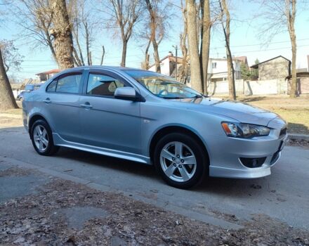 Серый Мицубиси Лансер, объемом двигателя 2 л и пробегом 280 тыс. км за 4750 $, фото 1 на Automoto.ua