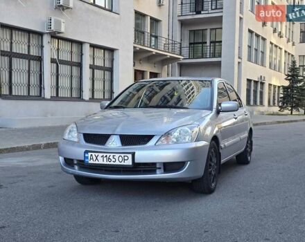 Сірий Міцубісі Lancer, об'ємом двигуна 1.58 л та пробігом 150 тис. км за 5200 $, фото 1 на Automoto.ua