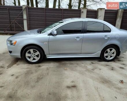 Серый Мицубиси Лансер, объемом двигателя 2 л и пробегом 234 тыс. км за 7200 $, фото 1 на Automoto.ua