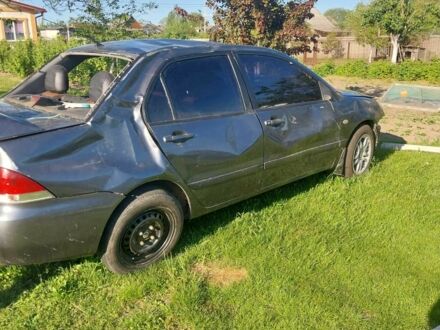 Сірий Міцубісі Lancer, об'ємом двигуна 0 л та пробігом 200 тис. км за 1500 $, фото 1 на Automoto.ua