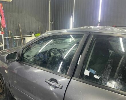 Сірий Міцубісі Lancer, об'ємом двигуна 1.6 л та пробігом 100 тис. км за 2500 $, фото 1 на Automoto.ua