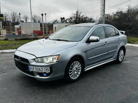 Сірий Міцубісі Lancer, об'ємом двигуна 2 л та пробігом 238 тис. км за 5350 $, фото 1 на Automoto.ua