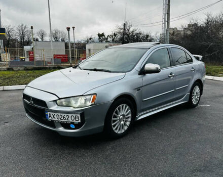 Серый Мицубиси Лансер, объемом двигателя 2 л и пробегом 238 тыс. км за 5350 $, фото 1 на Automoto.ua