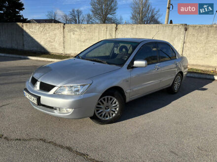 Сірий Міцубісі Lancer, об'ємом двигуна 1.6 л та пробігом 193 тис. км за 4000 $, фото 1 на Automoto.ua