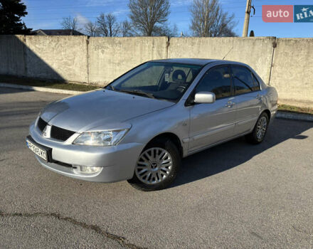 Серый Мицубиси Лансер, объемом двигателя 1.6 л и пробегом 193 тыс. км за 4000 $, фото 1 на Automoto.ua