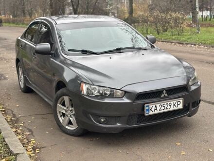 Серый Мицубиси Лансер, объемом двигателя 2 л и пробегом 240 тыс. км за 5450 $, фото 1 на Automoto.ua