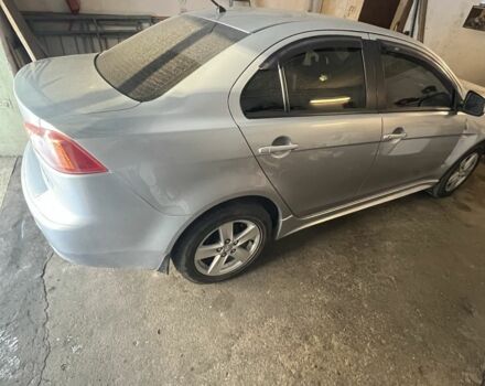 Серый Мицубиси Лансер, объемом двигателя 2 л и пробегом 175 тыс. км за 2000 $, фото 1 на Automoto.ua