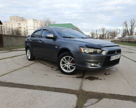 Серый Мицубиси Лансер, объемом двигателя 1.5 л и пробегом 228 тыс. км за 4699 $, фото 1 на Automoto.ua
