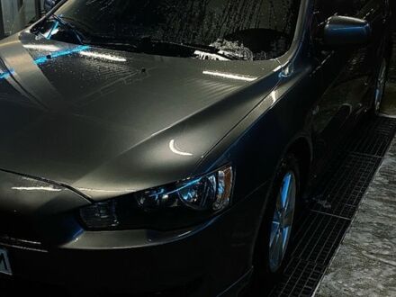 Серый Мицубиси Лансер, объемом двигателя 2 л и пробегом 215 тыс. км за 6800 $, фото 1 на Automoto.ua