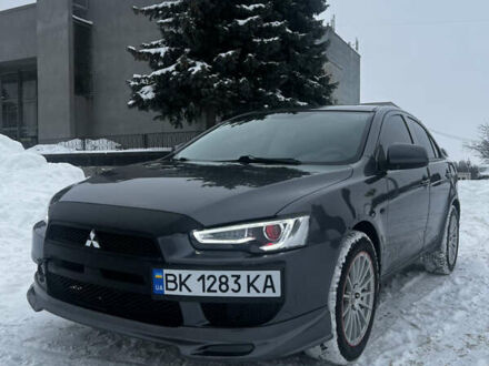 Серый Мицубиси Лансер, объемом двигателя 1.5 л и пробегом 206 тыс. км за 6399 $, фото 1 на Automoto.ua