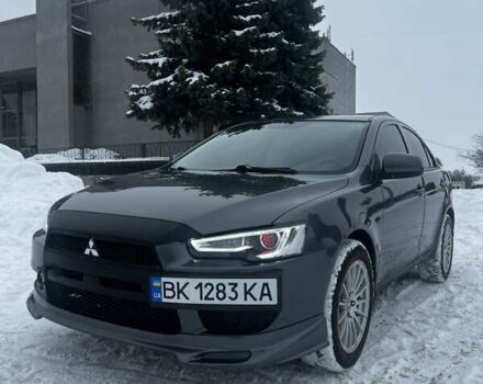 Серый Мицубиси Лансер, объемом двигателя 1.5 л и пробегом 206 тыс. км за 6399 $, фото 1 на Automoto.ua