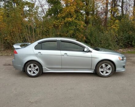 Серый Мицубиси Лансер, объемом двигателя 2 л и пробегом 189 тыс. км за 6200 $, фото 1 на Automoto.ua