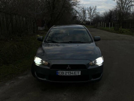 Серый Мицубиси Лансер, объемом двигателя 1.5 л и пробегом 255 тыс. км за 6500 $, фото 1 на Automoto.ua