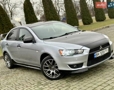Серый Мицубиси Лансер, объемом двигателя 2 л и пробегом 186 тыс. км за 6999 $, фото 1 на Automoto.ua