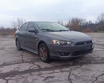 Серый Мицубиси Лансер, объемом двигателя 2 л и пробегом 191 тыс. км за 6400 $, фото 1 на Automoto.ua