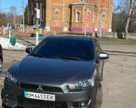 Серый Мицубиси Лансер, объемом двигателя 2 л и пробегом 247 тыс. км за 7350 $, фото 1 на Automoto.ua