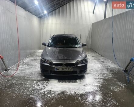 Серый Мицубиси Лансер, объемом двигателя 2 л и пробегом 355 тыс. км за 6500 $, фото 1 на Automoto.ua