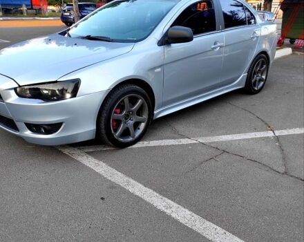 Серый Мицубиси Лансер, объемом двигателя 2 л и пробегом 226 тыс. км за 6999 $, фото 1 на Automoto.ua