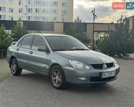 Сірий Міцубісі Lancer, об'ємом двигуна 1.6 л та пробігом 255 тис. км за 4700 $, фото 1 на Automoto.ua