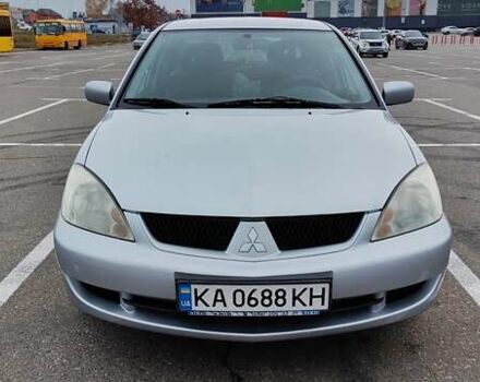 Сірий Міцубісі Lancer, об'ємом двигуна 1.58 л та пробігом 216 тис. км за 4700 $, фото 1 на Automoto.ua
