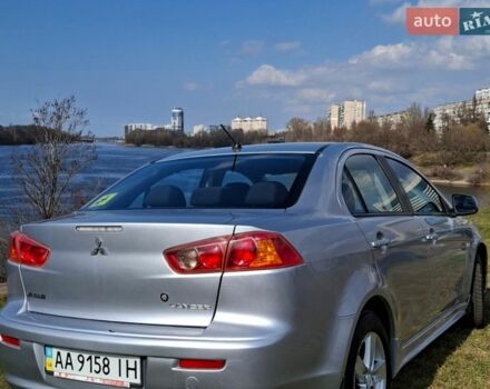 Серый Мицубиси Лансер, объемом двигателя 2 л и пробегом 225 тыс. км за 8500 $, фото 1 на Automoto.ua
