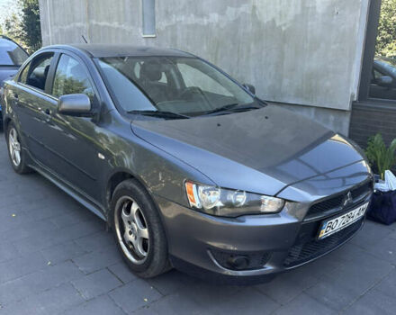 Серый Мицубиси Лансер, объемом двигателя 2 л и пробегом 152 тыс. км за 5500 $, фото 1 на Automoto.ua