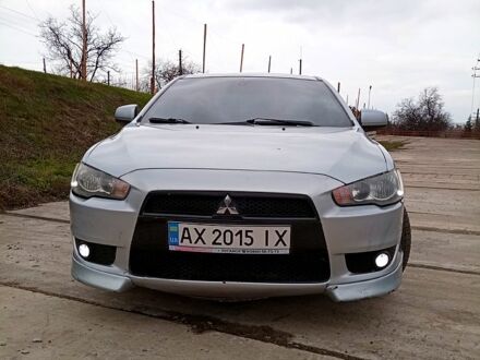 Сірий Міцубісі Lancer, об'ємом двигуна 2 л та пробігом 243 тис. км за 5500 $, фото 1 на Automoto.ua