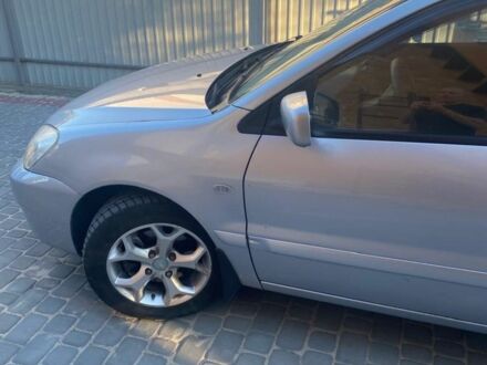 Сірий Міцубісі Lancer, об'ємом двигуна 1.6 л та пробігом 242 тис. км за 4500 $, фото 1 на Automoto.ua