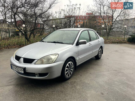 Сірий Міцубісі Lancer, об'ємом двигуна 1.58 л та пробігом 220 тис. км за 5900 $, фото 1 на Automoto.ua