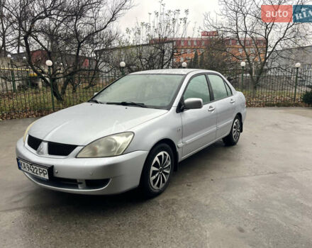 Серый Мицубиси Лансер, объемом двигателя 1.58 л и пробегом 220 тыс. км за 5900 $, фото 1 на Automoto.ua