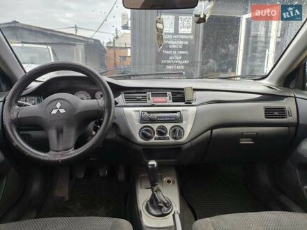 Сірий Міцубісі Lancer, об'ємом двигуна 1.6 л та пробігом 240 тис. км за 2999 $, фото 1 на Automoto.ua